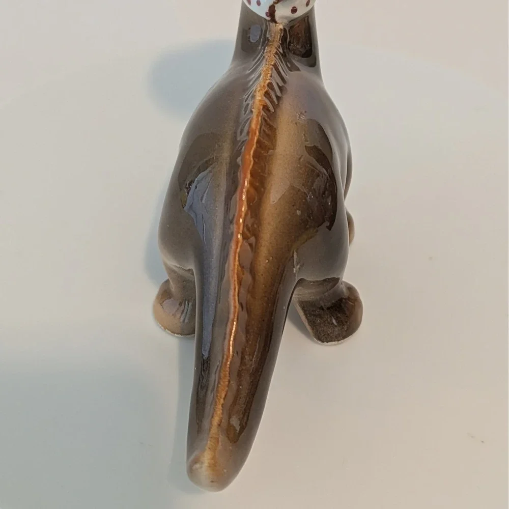 Vintage 1950s Norcrest Dinosaur Salt And pepper Shakers. Braids Teeth Boy Girl‎